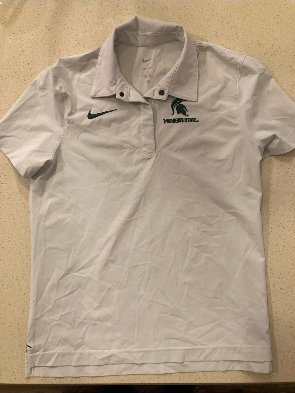 Nike White Short-Sleeve Michigan State Polo with Green Logo